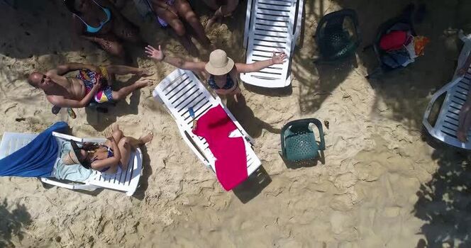 Aerial view of Cepe beach with people relaxing in Venezuela.