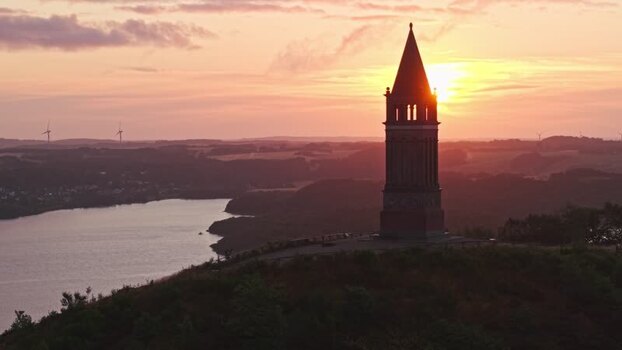 Aerial view of Himmelbjerget tower at sunset in Denmark.