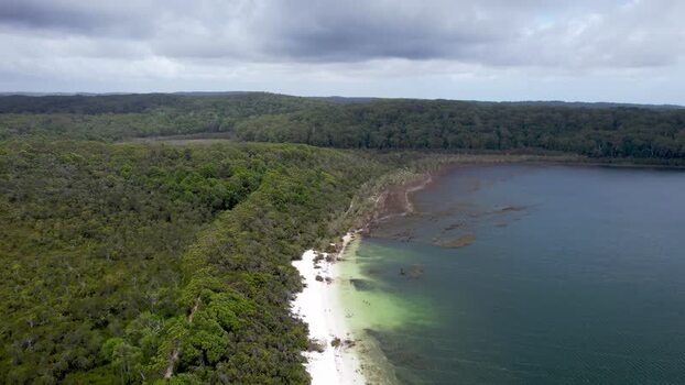Aerial view of Lake Birrabeen and lush forest Australia. Aerial view of Lake Birrabeen and lush forest Australia.