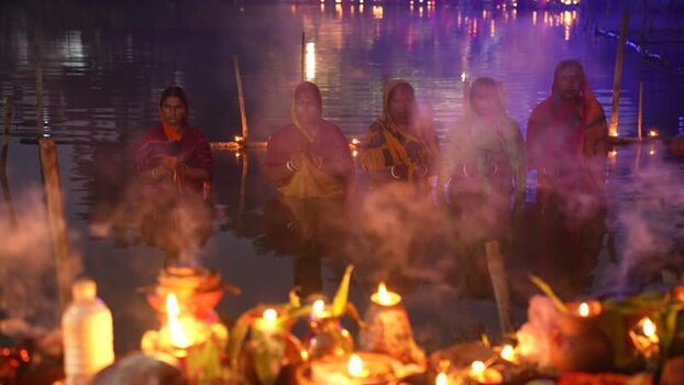 View of women performing a religious ritual at night Bangladesh. View of women performing a religious ritual at night Bangladesh.