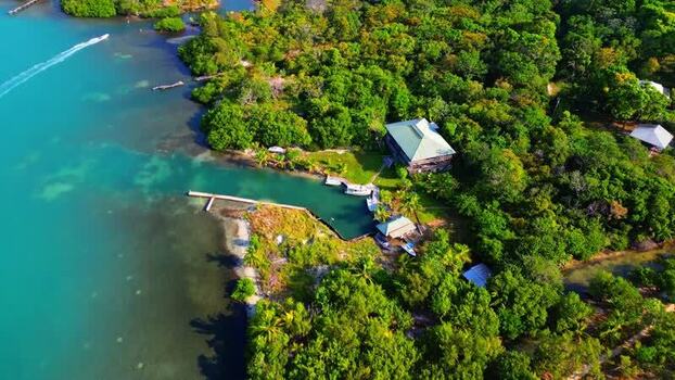 Aerial view of a tropical resort and pier in Guanaja Honduras.