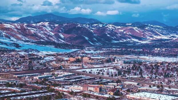Aerial view of Denver with snow capped mountains United States.