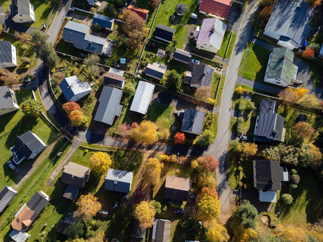 Aerial view of Takalaanila residential area with houses green lawns and autumn trees in Oulu North Ostrobothnia Finland. Aerial view of Takalaanila residential area with houses green lawns and autumn trees in Oulu North Ostrobothnia Finland.