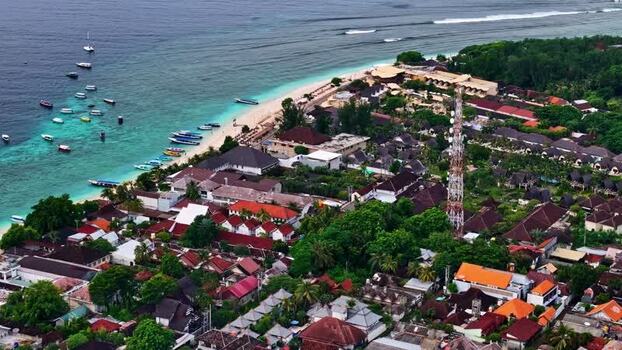 Aerial view of coastal resort with boats in Bali Indonesia.