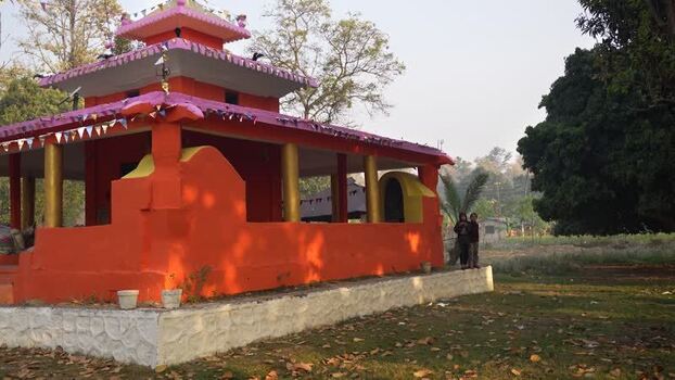 View of a small orange Hindu temple in Dhangadhi Nepal. View of a small orange Hindu temple in Dhangadhi Nepal.