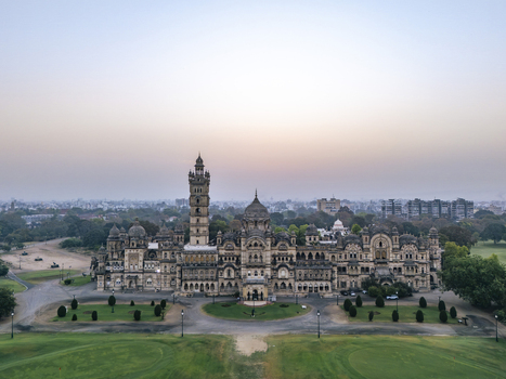 Vadodara India 14 March 2026 Aerial view of the Laxmi Vilas Palace featuring its ornate Indo Saracenic architecture tall tower and sprawling green grounds. Vadodara India 14 March 2026 Aerial view of the Laxmi Vilas Palace featuring its ornate Indo Saracenic architecture tall tower and sprawling green grounds.