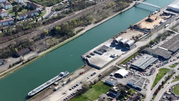 Aerial view of canal and industrial area France.