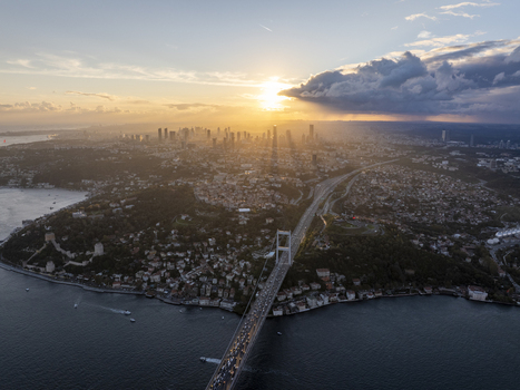Aerial view of Fatih Sultan Mehmet Bridge spanning the Bosphorus at sunset with the Istanbul skyline in the background Beykoz Istanbul Turkey. Aerial view of Fatih Sultan Mehmet Bridge spanning the Bosphorus at sunset with the Istanbul skyline in the background Beykoz Istanbul Turkey.