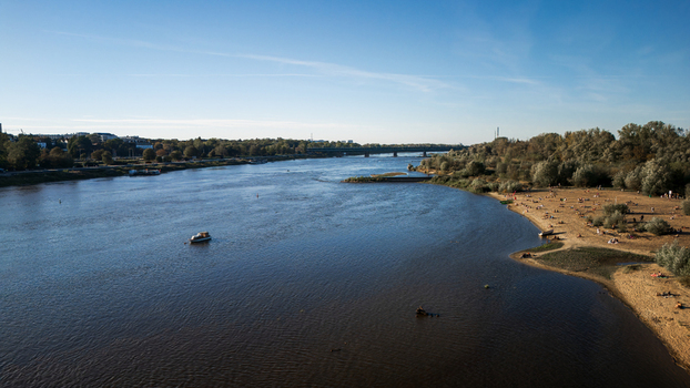 Aerial view of the Vistula River reflecting the clear sky with sandy beaches meeting the water s edge Warsaw Poland. Aerial view of the Vistula River reflecting the clear sky with sandy beaches meeting the water s edge Warsaw Poland.