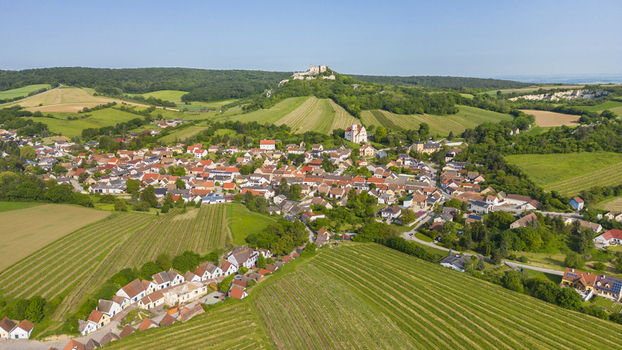 Aerial view of the quaint village nestled among verdant fields crowned by the imposing Falkenstein Castle a blend of history and nature Falkenstein bei Poysdorf Lower Austria Austria. Aerial view of the quaint village nestled among verdant fields crowned by the imposing Falkenstein Castle a blend of history and nature Falkenstein bei Poysdorf Lower Austria Austria.
