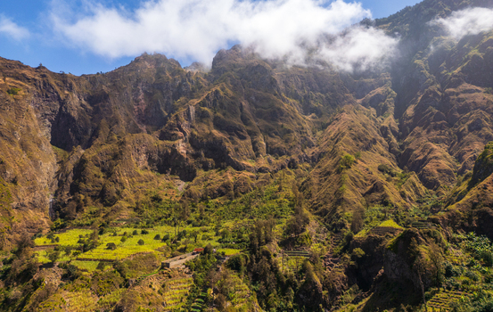 Aerial view of the lush terraced fields and steep rocky slopes of the Trilha do Vale do Paul in Faja de Cima Paul Cabo Verde.