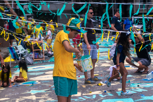 Rio de Janeiro Brazil 13 June 2026 View of people decorating a street with green and yellow ribbons and painting the asphalt in preparation for the World Cup 2026.