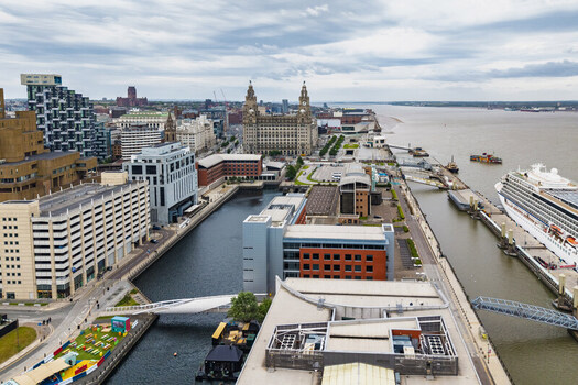 Aerial view of the Royal Liver Building and the historic Pier Head waterfront in Liverpool England United Kingdom.