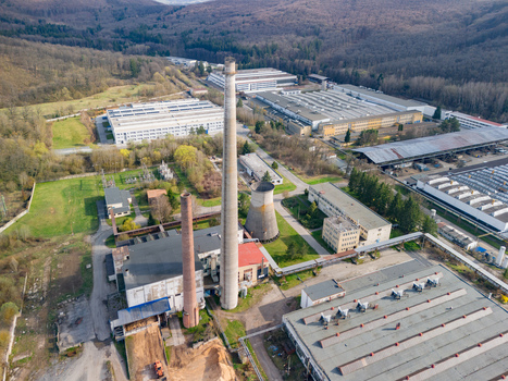 Aerial view of industrial buildings contrasting with the surrounding forest a blend of utility and nature PPS GROUP a.s. Detva Banskobystricky kraj Slovakia. Aerial view of industrial buildings contrasting with the surrounding forest a blend of utility and nature PPS GROUP a.s. Detva Banskobystricky kraj Slovakia.