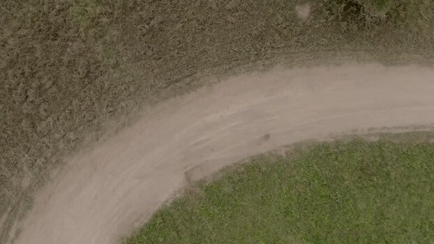 Aerial view of a dirt road in Swara Plains Conservancy Kenya. Aerial view of a dirt road in Swara Plains Conservancy Kenya.