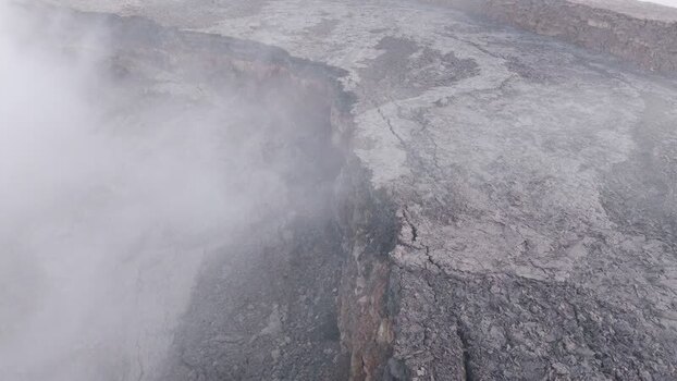Aerial view of Erta Ale Volcano with smoke and volcanic rock Ethiopia. Aerial view of Erta Ale Volcano with smoke and volcanic rock Ethiopia.