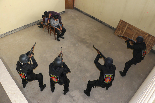 Dhaka Bangladesh 06 January 2017 View of RAB personnel conducting a tactical training exercise with rifles and simulated hostages at the RAB Headquarters. Dhaka Bangladesh 06 January 2017 View of RAB personnel conducting a tactical training exercise with rifles and simulated hostages at the RAB Headquarters.