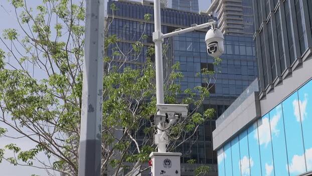 View of surveillance camera in urban Shenzhen China. View of surveillance camera in urban Shenzhen China.