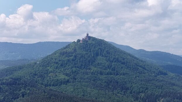 Aerial view of Haut Koenigsbourg Castle on a forested hill France.