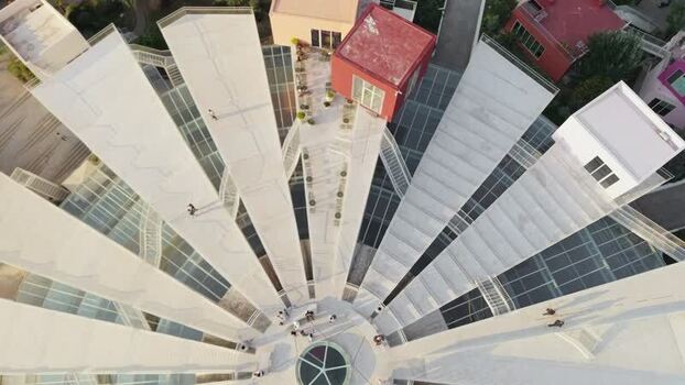 Aerial view of the Pyramid of Tirana with people Albania.