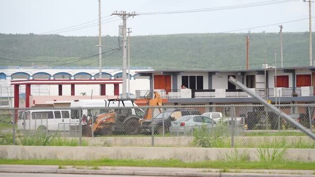 View of businesses and homes in San Jose Northern Mariana Islands. View of businesses and homes in San Jose Northern Mariana Islands.