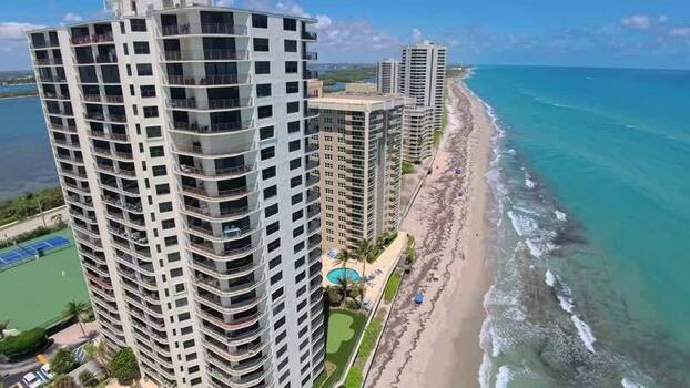 Aerial view of beachfront condominiums on Singer Island United States. Aerial view of beachfront condominiums on Singer Island United States.