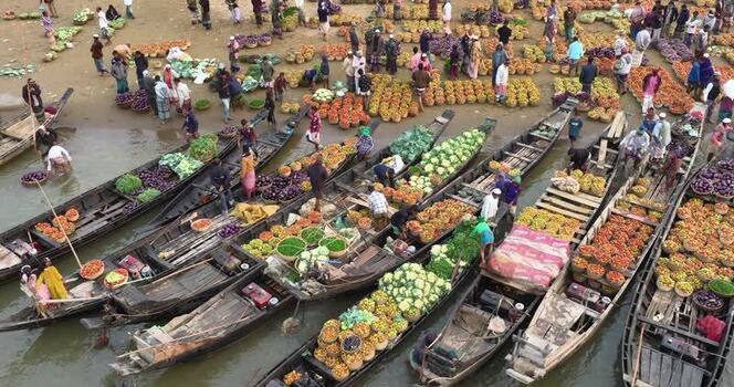 Aerial view of a floating vegetable market in Sylhet Bangladesh. Aerial view of a floating vegetable market in Sylhet Bangladesh.