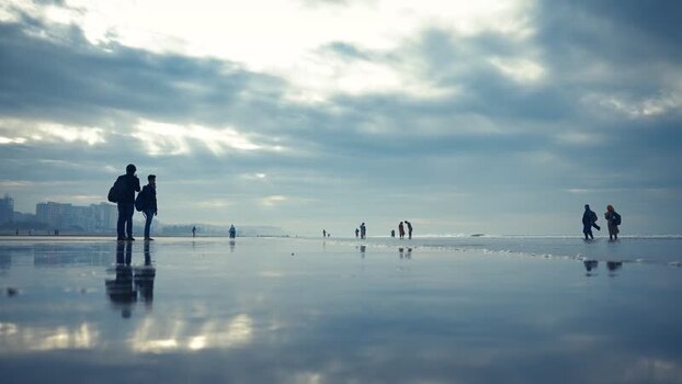 View of people walking on Cox s Bazar beach Bangladesh. View of people walking on Cox s Bazar beach Bangladesh.