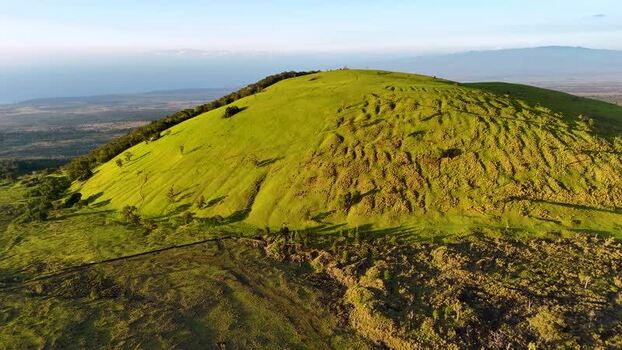 Aerial view of Puu Waawaa cinder cone and volcanic ridges United States. Aerial view of Puu Waawaa cinder cone and volcanic ridges United States.