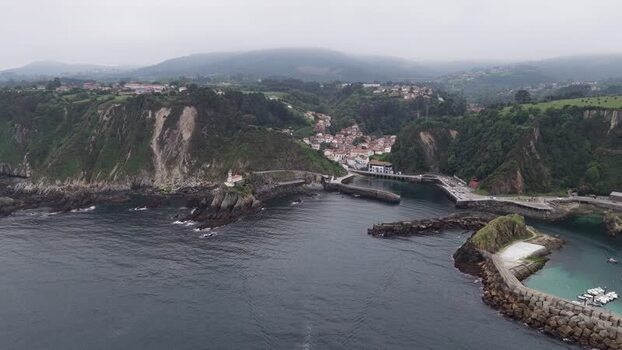 Aerial view of Cudillero coastal town and lighthouse Spain. Aerial view of Cudillero coastal town and lighthouse Spain.
