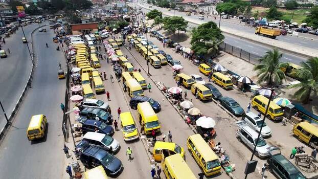 Aerial view of busy bus terminal in Ojodu Berger Nigeria. Aerial view of busy bus terminal in Ojodu Berger Nigeria.