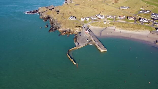 Aerial view of the pier and beach at Portnablagh Ireland.