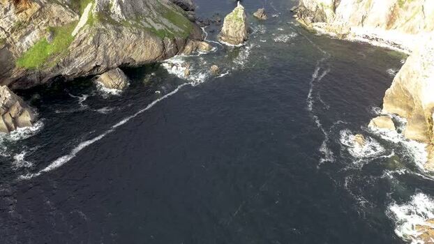 Aerial view of rugged coastal cliffs at An Port Ireland.