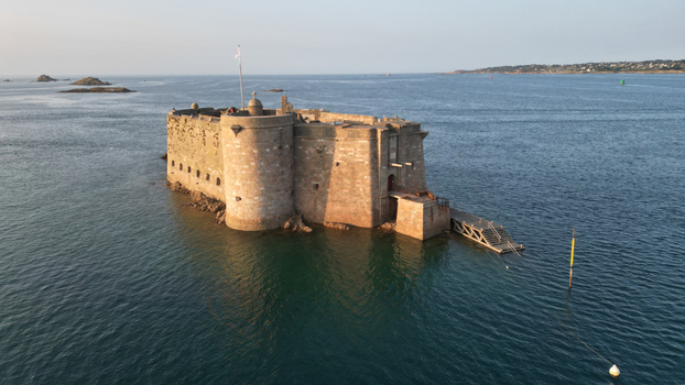 Aerial view of the imposing Ch&acirc;teau du Taureau standing defiant against the sea s embrace a testament to history and resilience Plouezoc h Bretagne France.