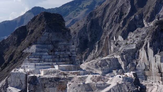 Aerial view of marble quarries in the mountains of Italy. Aerial view of marble quarries in the mountains of Italy.