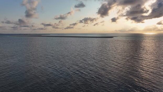 Aerial view of a sandbank at sunset in Gulhi Maldives. Aerial view of a sandbank at sunset in Gulhi Maldives.
