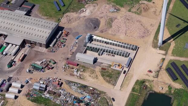 Aerial view of Chelveston Wind Farm and solar panels United Kingdom. Aerial view of Chelveston Wind Farm and solar panels United Kingdom.