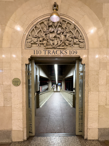 New York United States 14 May 2026 View of the ornate entrance to tracks 109 and 110 at Grand Central Terminal featuring decorative stone carvings and a classic light fixture. New York United States 14 May 2026 View of the ornate entrance to tracks 109 and 110 at Grand Central Terminal featuring decorative stone carvings and a classic light fixture.
