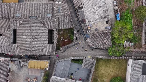 Aerial view of traditional tiled roofs and narrow streets China.