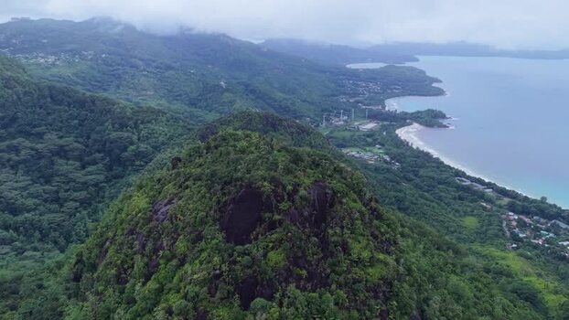 Aerial view of lush green mountain peak in Victoria Seychelles.
