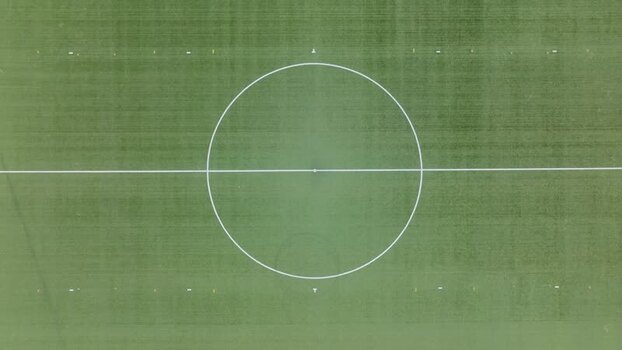 Aerial view of soccer field center circle in Lofoten Norway.