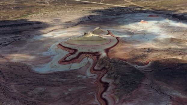 Aerial view of the colorful layered hills of Kyzyl Kup Kazakhstan. Aerial view of the colorful layered hills of Kyzyl Kup Kazakhstan.