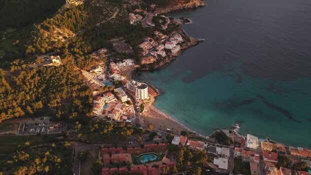 Aerial view of the coastal town of Sant Elm at sunset Spain.