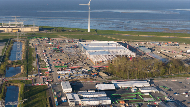 Eemshaven Netherlands 21 April 2026 Aerial view of the Google GRQ data center construction site surrounded by wind turbines and industrial infrastructure near the coast. Eemshaven Netherlands 21 April 2026 Aerial view of the Google GRQ data center construction site surrounded by wind turbines and industrial infrastructure near the coast.