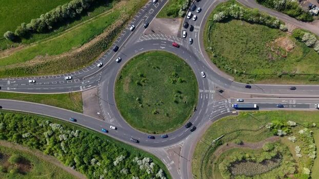 Aerial view of a busy traffic roundabout United Kingdom.
