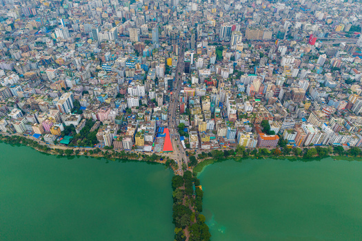 Dhaka Bangladesh 19 June 2026 Aerial view of Gulshan Lake surrounded by dense urban development high rise buildings and residential neighborhoods in the city.