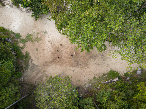Aerial view of Tanjung Gelam Beach where the sandy expanse meets the vibrant green canopy Karimunjawa Central Java Indonesia. Aerial view of Tanjung Gelam Beach where the sandy expanse meets the vibrant green canopy Karimunjawa Central Java Indonesia.