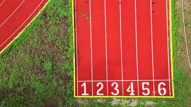 Aerial view of a red running track with lane numbers in Mexico. Aerial view of a red running track with lane numbers in Mexico.