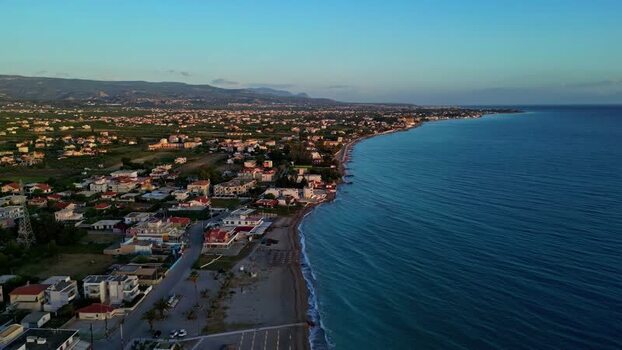 Aerial view of coastal town along the beach in Greece.