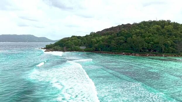 Aerial view of the lush coastline of Praslin Seychelles. Aerial view of the lush coastline of Praslin Seychelles.